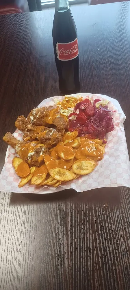 Fry Chicken with Plantain Slices Pollo Frito Con Tajadas De Platano Verde